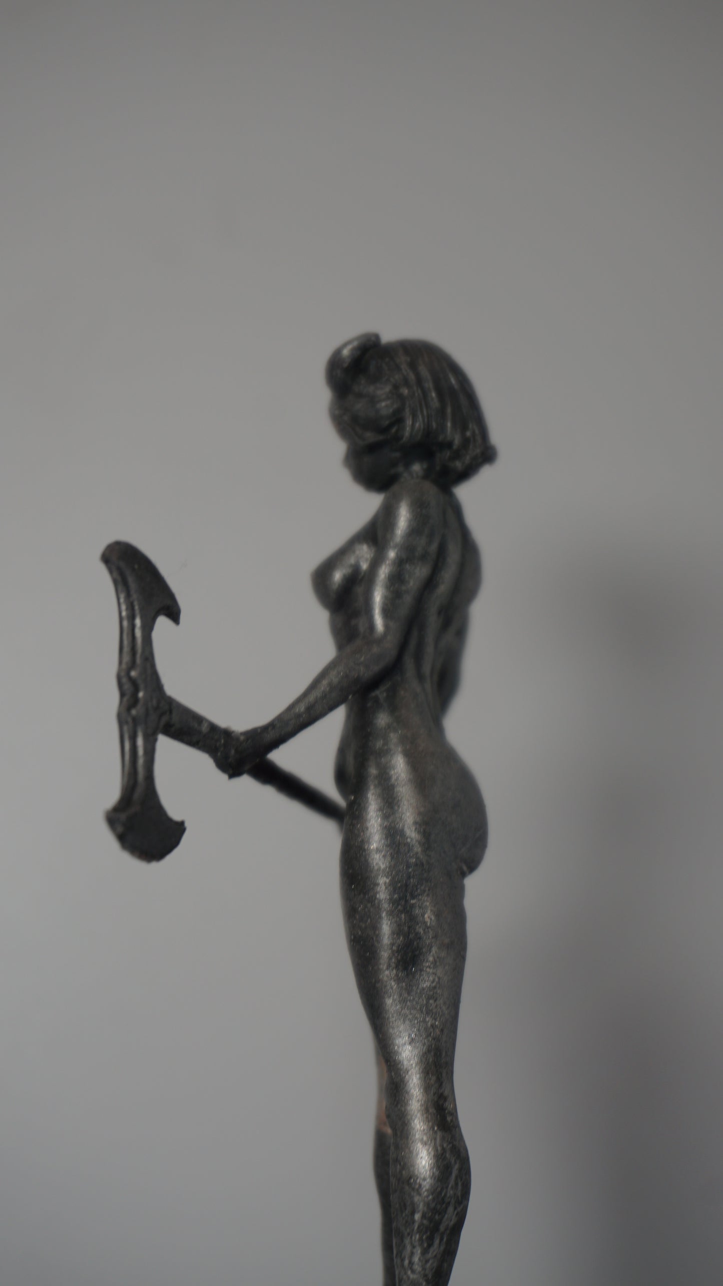 The Axe Maiden Statue